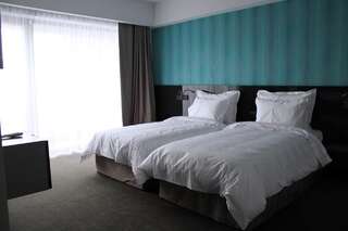 Отель Hotel Tempo Тыргу-Муреш Улучшенный двухместный номер с 2 отдельными кроватями-1